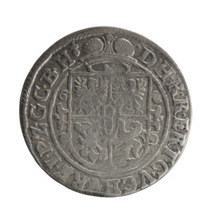 Obv.: A bust in armor turned right, girded with a sash, holding a sceptre in his right hand. In