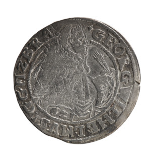 Obv. A bust in armor turned right, girded with a sash. A sceptre in his right hand. In front of the