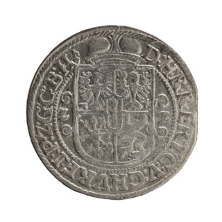 Obv. Bust facing right in a mitre, wide ruff, and armor girded with a sash. A sceptre in his right