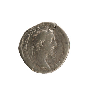 Denarius of Commodus (reigned 177–192). Obverse: Emperor's head right, wearing a laurel wreath;