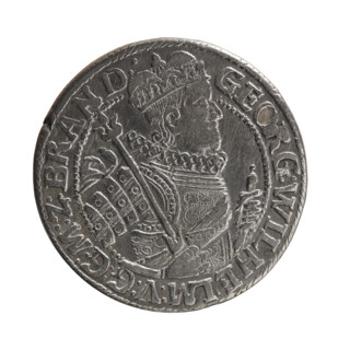 Obv. Bust facing right in a mitre, wide ruff, and armor girded with a sash. A sceptre in his right