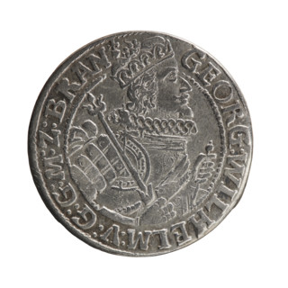 Obv. Bust facing right in a mitre, wide ruff and armor girded with a sash. A sceptre in his right