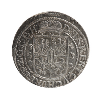 Obv. Bust facing right in a mitre, wide ruff and armor girded with a sash. A sceptre in his right