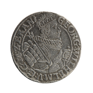 Obv. Bust facing right in a mitre, wide ruff and armor girded with a sash. A sceptre in his right
