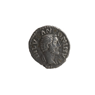 Denarius, posthumous issue after 161 CE. Obverse: head of Antoninus Pius, bare, drapery on left