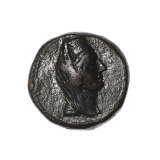 Bronze coin, Pantikapaion (as Kaisarea). Obverse: head of a woman in a kalathos and a veil