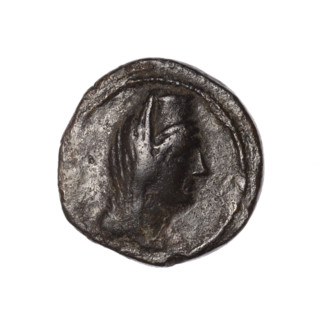 Bronze coin, Pantikapaion (as Kaisarea); obverse: woman's head in kalathos and veil (Aphrodite