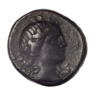 Bronze coin from Pantikapaion; obverse: head of young Dionysus in an ivy wreath facing right;
