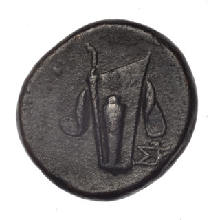 bronze coin from Pantikapaion; obverse: head of young Dionysus in an ivy wreath facing right;