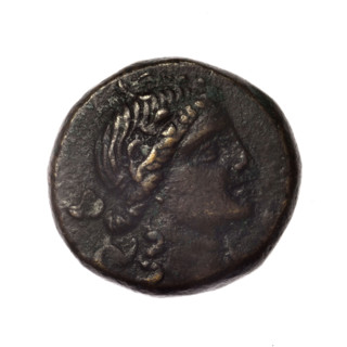 Bronze coin, Pantikapaion; obverse: head of young Dionysus in ivy wreath facing right; reverse: bow