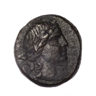 bronze coin, Pantikapaion; obv.: head of young Dionysus in an ivy wreath facing right; reverse: bow