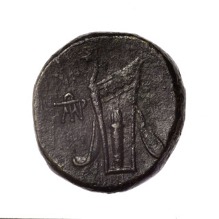 bronze coin, Pantikapaion; obv.: head of young Dionysus in an ivy wreath facing right; reverse: bow