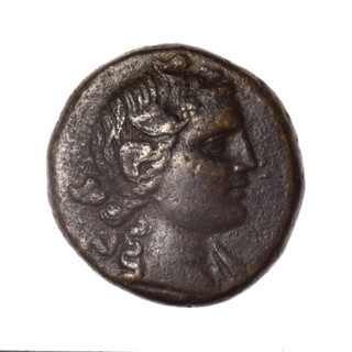 Bronze coin from Pantikapaion; obverse: head of young Dionysus in ivy wreath facing right; reverse: