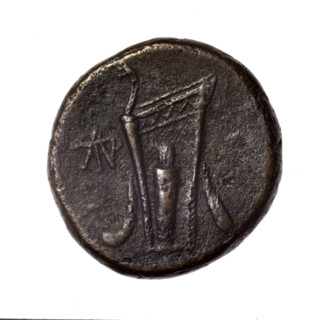 Bronze coin from Pantikapaion; obverse: head of young Dionysus in ivy wreath facing right; reverse: