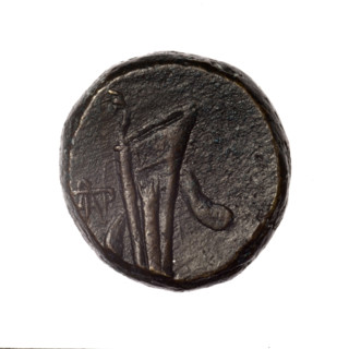 bronze coin, Pantikapaion; obv.: head of young Dionysus in an ivy wreath facing right; rv.: bow and