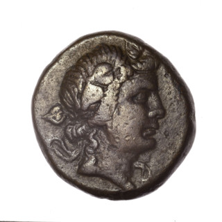 bronze coin, Pantikapaion; obverse: head of young Dionysus in an ivy wreath facing right; reverse: