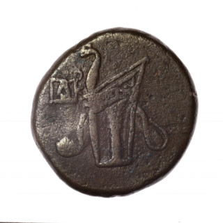 bronze coin, Pantikapaion; obv.: head of young Dionysus in an ivy wreath facing right; reverse: bow