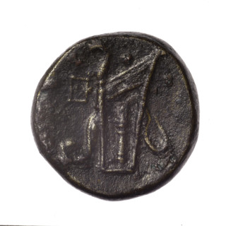 Bronze coin from Pantikapaion. Obverse: head of young Dionysus in ivy wreath facing right. Reverse: