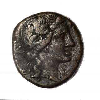 Bronze coin, Pantikapaion; obv.: head of young Dionysus in an ivy wreath facing right; rv.: bow and