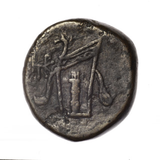 Bronze coin, Pantikapaion; obv.: head of young Dionysus in an ivy wreath facing right; rv.: bow and