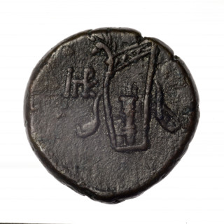 bronze coin, Pantikapaion; obverse: head of young Dionysus in an ivy wreath facing right; reverse: