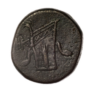 Bronze coin, Pantikapaion; obv.: head of young Dionysus in an ivy wreath facing right; rv.: bow and