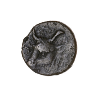 Bronze coin from Pantikapaion depicting a bearded Satyr's head left and a bull's head left; letters