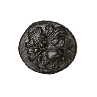 Bronze coin, Pantikapaion; obverse: head of a bearded Satyr in an ivy wreath to the left, pierced