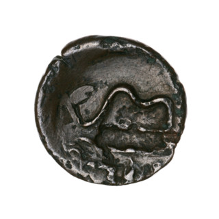bronze coin, Pantikapaion; obverse: head of bearded Satyr in ivy wreath facing left, pierced on