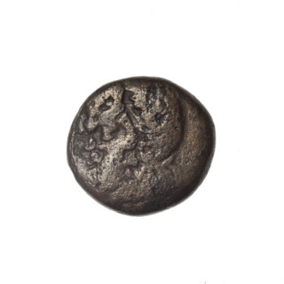 Bronze coin from Pantikapaion; obverse: head of bearded Satyr in ivy wreath facing left; reverse: