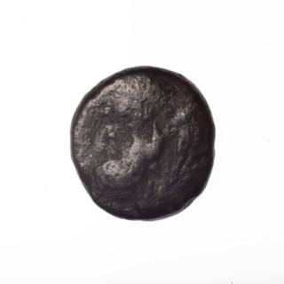 bronze coin, Pantikapaion; head of a bearded Satyr in an ivy wreath facing left (obverse);