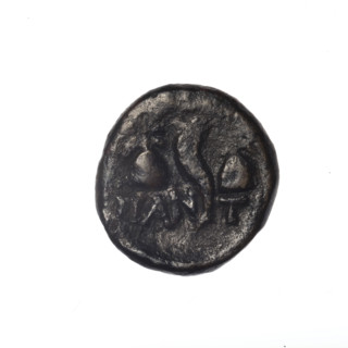 bronze coin, Pantikapaion; head of a bearded Satyr in an ivy wreath facing left (obverse);