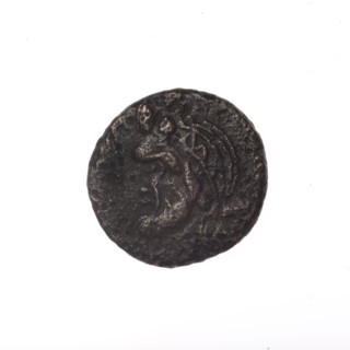 bronze coin, Pantikapaion; head of a bearded Satyr in an ivy wreath facing left (obverse);