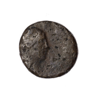 Bronze coin from Pantikapaion, obverse: head of Apollo in a laurel wreath facing right; behind it a
