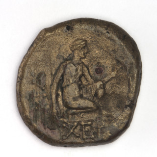 Bronze coin, Chersonesos; obverse: eagle-headed griffin to the left; reverse: Artemis (Deva)