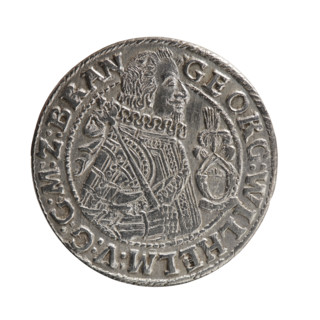 Obv. Bust in a wide ruff and armor facing right, girded with a sash. A sceptre in his right hand.