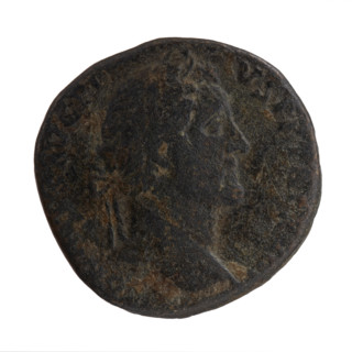 Sestertius of Antoninus Pius (86–161; Roman emperor 138–161). Obverse: Head of Antoninus Pius in a