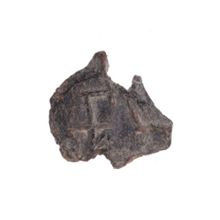 Fragment of a double-sided Drohiczyn seal. One side: an eagle with its head turned to the left.
