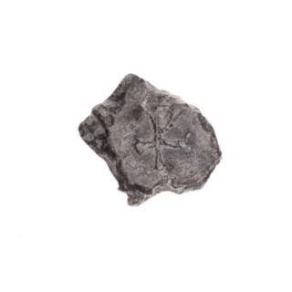 Fragment of a double-sided Drohiczyn seal. On one side, a cross with one arm ending in a triangle
