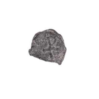 Fragment of a double-sided Drohiczyn seal. On one side a cross with one arm ending in a triangle