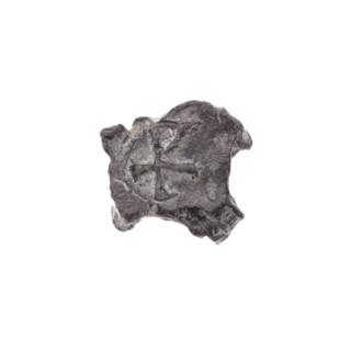 Fragment of a double-sided Drohiczyn seal. On one side, a cross with one arm ending in a triangle