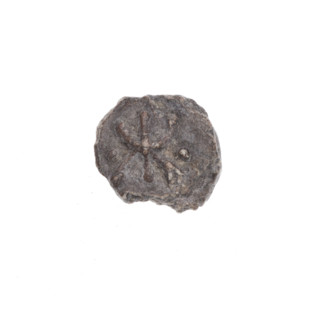 A fragment of a double-sided Drohiczyn seal. On one side, a bident with a crossed-out right arm. On