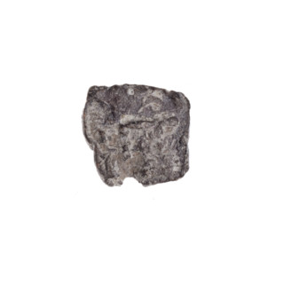 Fragment of a double-sided Drohiczyn seal. On one side, probably a two-pronged shape is visible; on