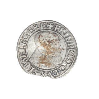 Obverse: Male bust turned right, with a beard and sideburns, in a coat with a wide collar; in the