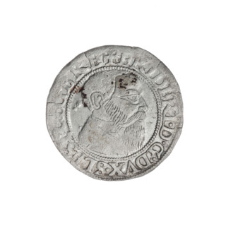 Obverse: Male bust turned right, with a beard and sideburns, in a coat with a wide collar; in the
