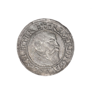 Obverse: Male bust turned right, with a beard and sideburns, wearing a coat with a wide collar; in