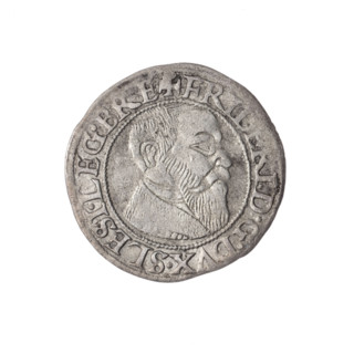 Obverse: Male bust turned right, with a beard and sideburns, wearing a coat with a wide collar; in