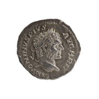 Denarius of Caracalla (188–217 CE). Obverse: Head of Caracalla with laurel wreath facing right;