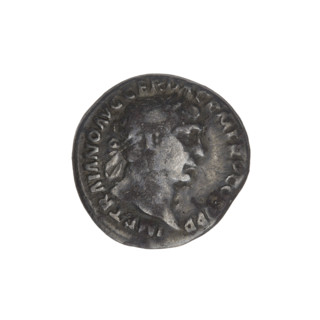 Denarius; Obverse: head of Trajan wearing a laurel wreath, facing right; rim inscription: IMP