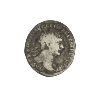 Denarius; obverse: head of Trajan right, laurel wreath; rim inscription (poorly legible). Reverse: